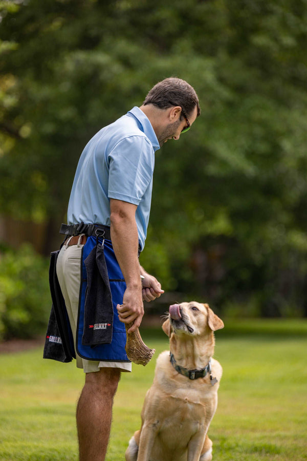 man-feeding-his-dog